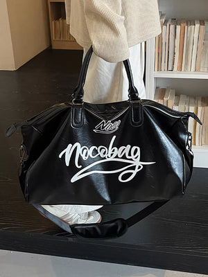 Sleek black pu leather travel bag with white script logo and top handles.