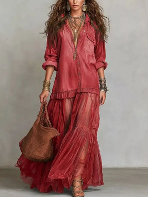 Sheer ruffle maxi dress in cerise with buttoned detailing and long sleeves.
