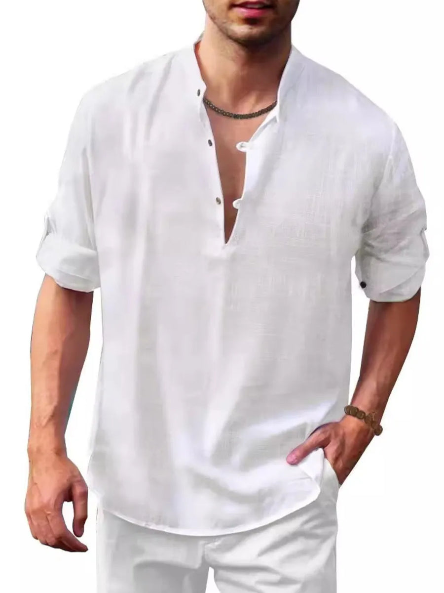 White half-button shirt with mandarin collar and rolled sleeves.