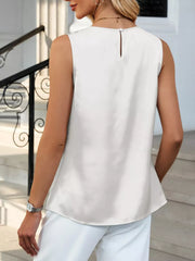 Off-white pleated round neck sleeveless tank top with keyhole back detail.