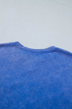 Blue cotton t-shirt with washed effect and notched neckline detail