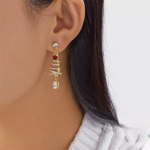 clear earrings featuring dangle style and christmas tree motif