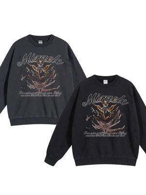 Miracle graphic oversized sweatshirt in black and dark gray with angel and text print