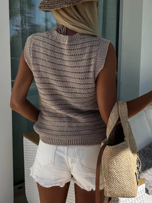 Beige open-stitch sleeveless knit tank top with horizontal stripe pattern and mock neck.