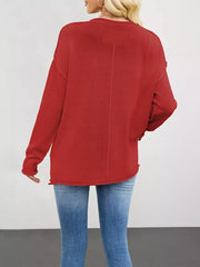 crewneck sweater in Black with exposed seam and hip-length