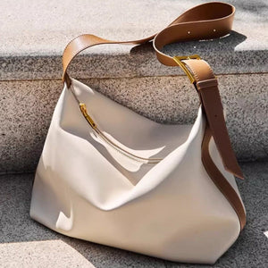White pu leather shoulder bag with brown strap and gold buckle detail