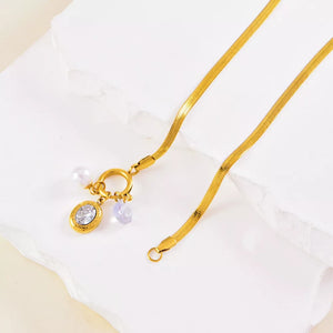 Artificial turquoise, 18K Gold-Plated, Stainless Steel, Zircon Care instructions necklace in gold with chain silhouette