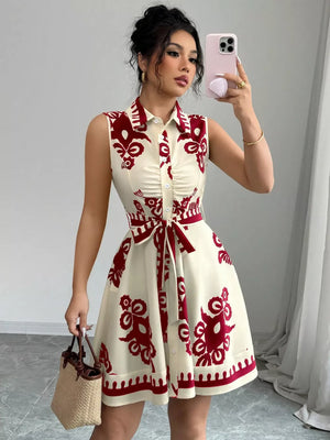 Cream and burgundy print button-down dress with tie waist and ruching detail.