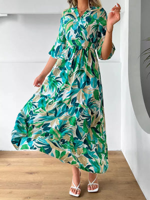 white midi dress with floral and v-neck