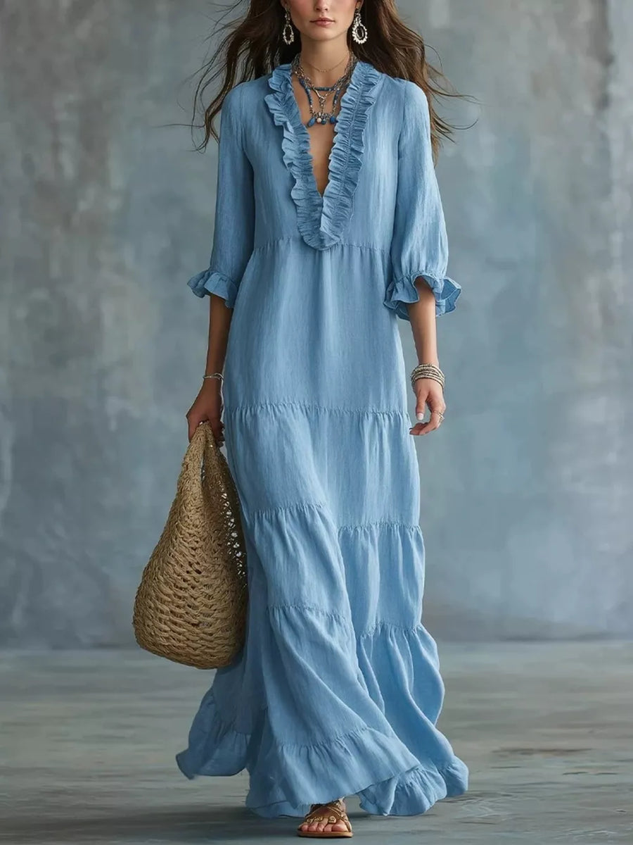 maxi dress in light blue featuring ruffled and A-line fit
