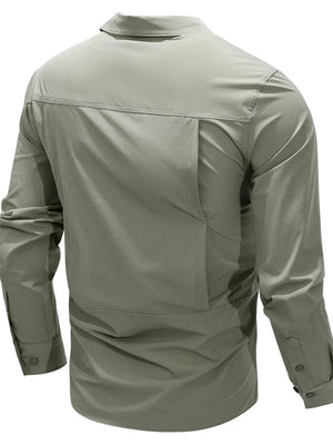 Bean green cotton overshirt with long sleeves and flap pocket detail on back.