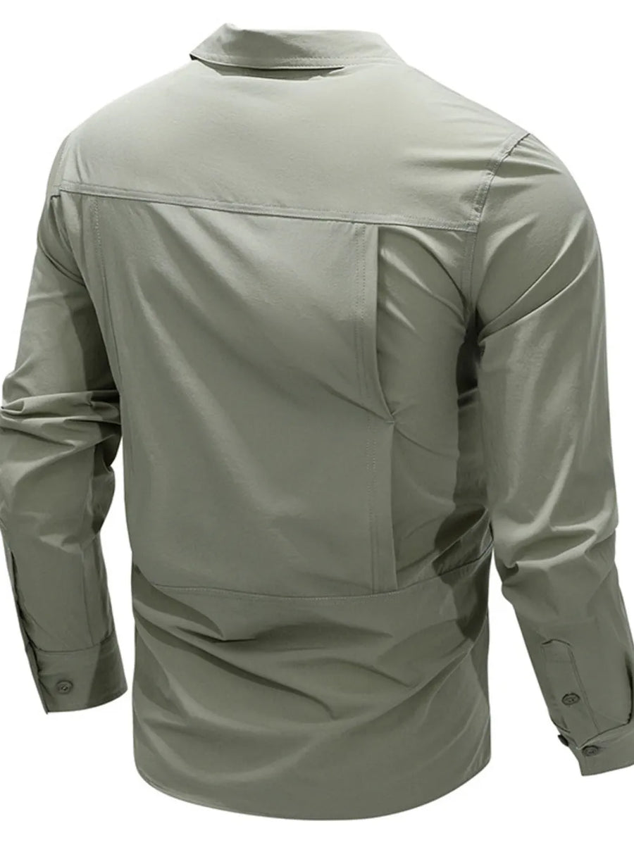 Bean green cotton overshirt with long sleeves and flap pocket detail on back.