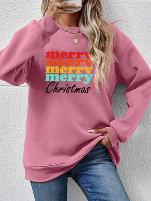 Blush Pink sweatshirt with retro "Merry Christmas" graphic in stacked rainbow colors.