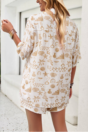 Women's white button-down shirt with abstract tan beach print, short sleeves, and resort collar.