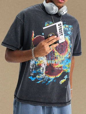 Acid wash black graphic t-shirt with crew neck and short sleeves, featuring abstract art print.