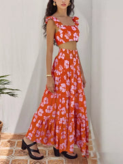 Orange-Red floral ruffled crop top and tiered maxi skirt set with square neckline.