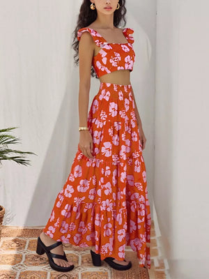 Orange-Red floral ruffled crop top and tiered maxi skirt set with square neckline.