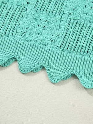 Pointelle knit sweater in teal with scalloped trim and cable knit details.