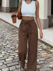100% polyester Care instructions: Machine wash cold wide-leg pants in cocoa brown with flared silhouette