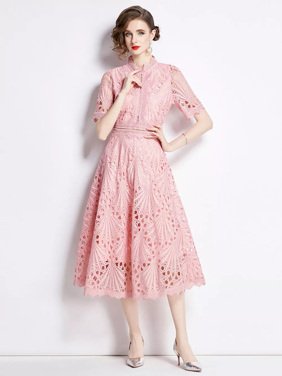 Pink lace midi dress with delicate sleeves and a-line skirt.