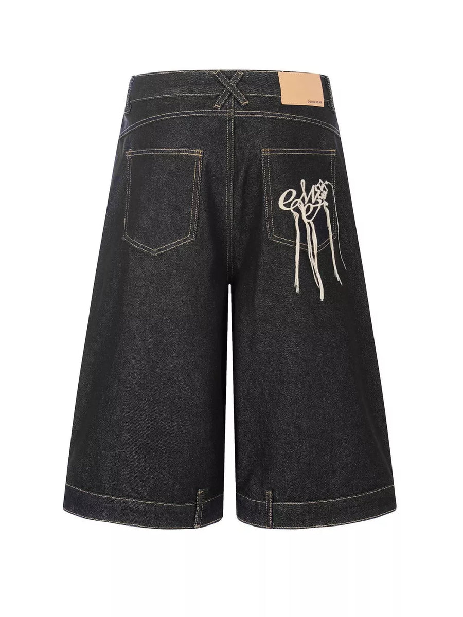 75 capris in dark wash denim with wide-leg silhouette