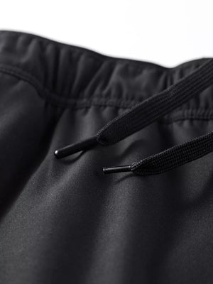 Black sweatpants with drawstring detail