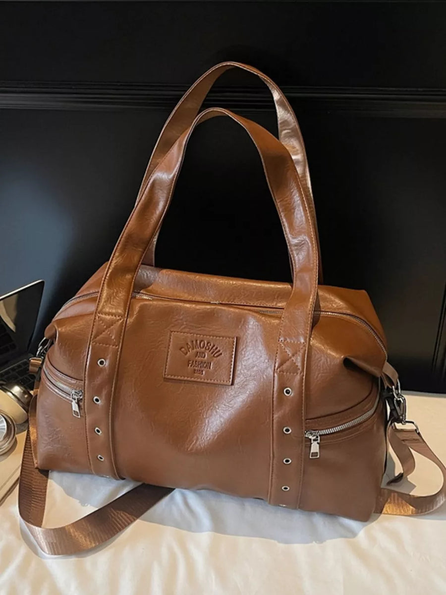 Chic brown pu leather shoulder bag with adjustable strap and silver hardware details.
