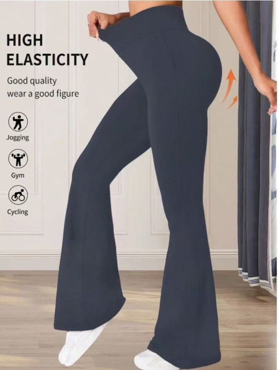 Premium high waist flare pants in gray, made of comfortable cotton, showing off a flattering fit.