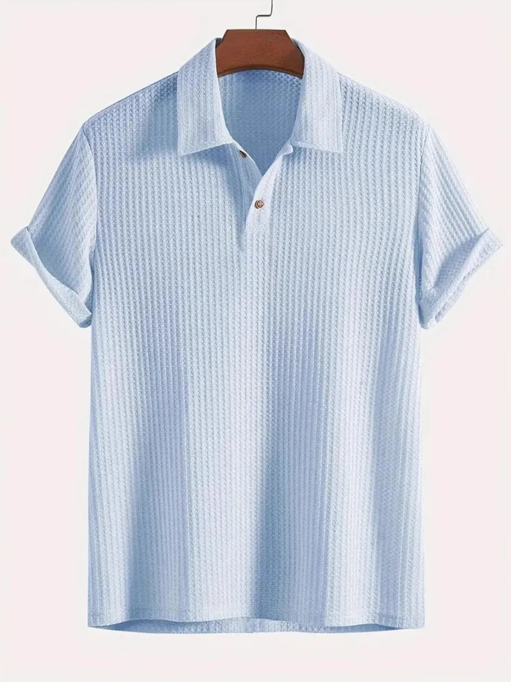 Light blue textured polo shirt with rolled sleeves and a two-button placket.