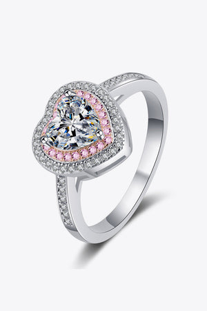 Sterling silver ring with heart-shaped moissanite and pink halo accents