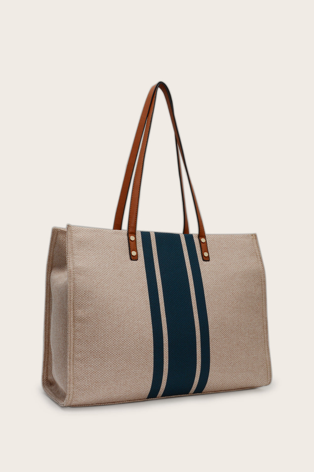 Nautical canvas tote bag in khaki with navy stripes and leather trim.