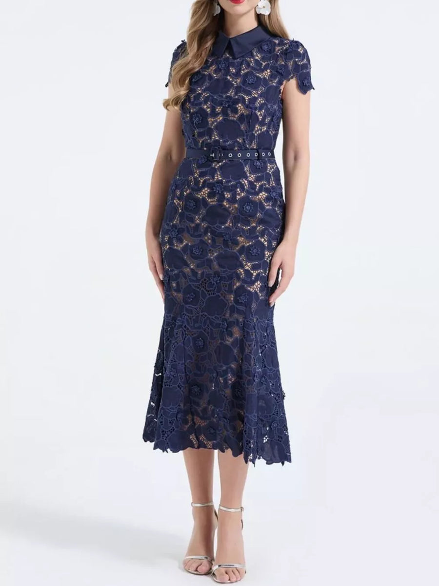 Dark blue floral lace midi dress with collar, cap sleeves, belt, and flared hem.