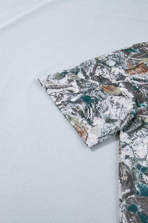 Earthy camouflage print henley t-shirt with short sleeves and button detail.