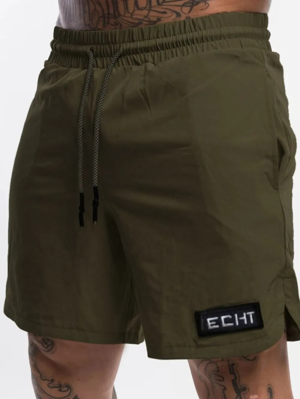 Army green performance shorts with drawstring and logo patch