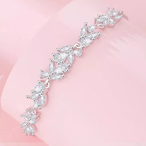 clear bracelet featuring zircon embellishment and floral