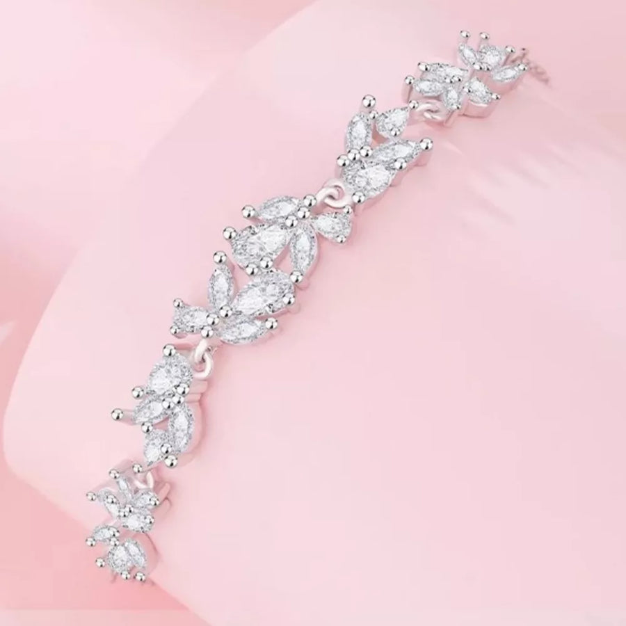 clear bracelet featuring zircon embellishment and floral