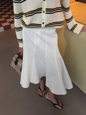 100% Cotton Care instructions: Machine wash cold midi skirt in White with flared silhouette