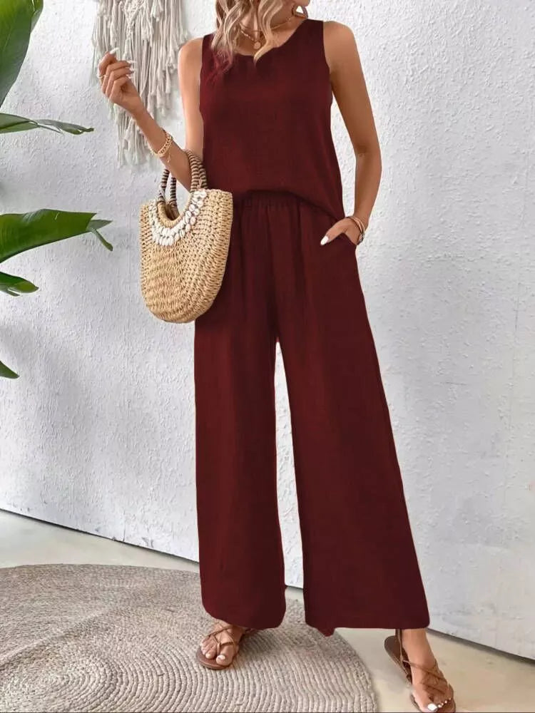Burgundy polyester two-piece set with round neck tank and wide-leg pants, featuring lace detail.