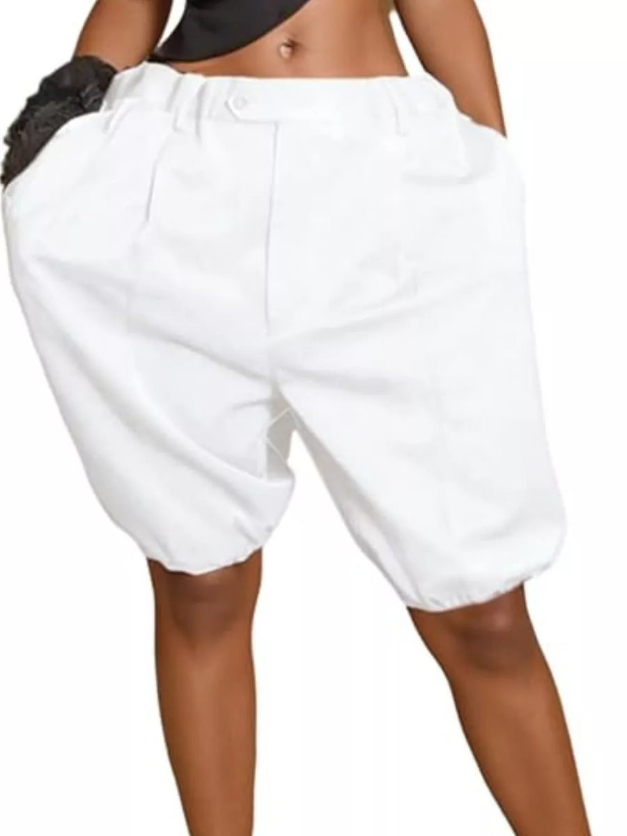 White pleated high-waisted shorts with drawstring and balloon leg detail.