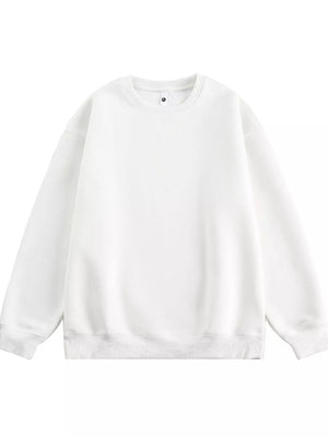 Oversized white crew-neck sweatshirt with ribbed cuffs and hem.