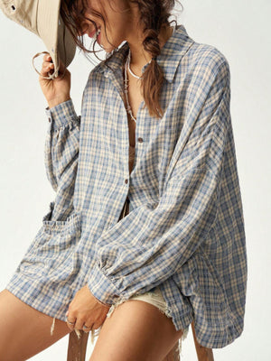 cream button-down shirt featuring button cuffs and plaid