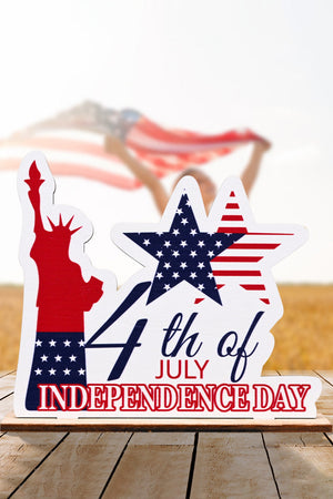 Patriotic Americana wooden tabletop decor with Statue of Liberty and stars and stripes.