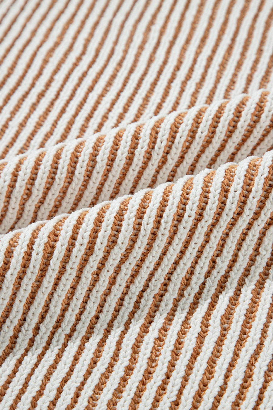 Camel and white striped knit sweater with a textured stitch detail