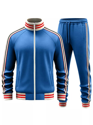 French blue tracksuit with white zipper and striped collar, cuffs, and leg stripes.
