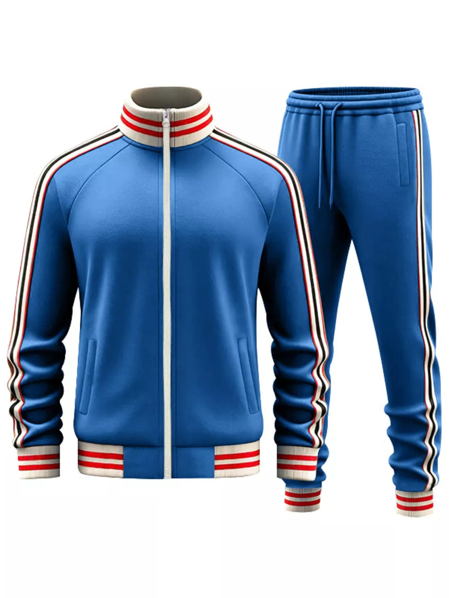 French blue tracksuit with white zipper and striped collar, cuffs, and leg stripes.