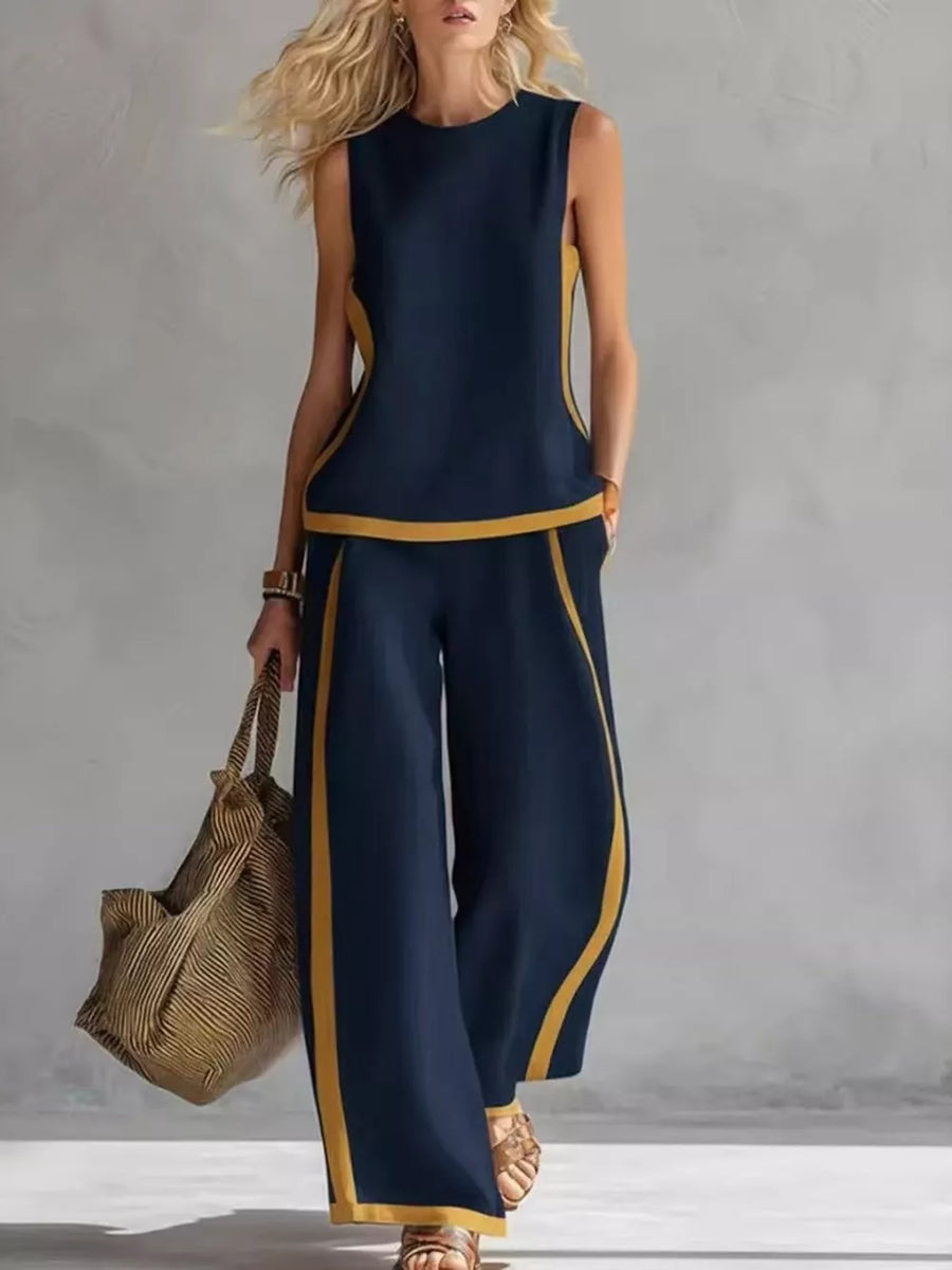 Navy blue sleeveless tank and wide-leg pants set with yellow trim.