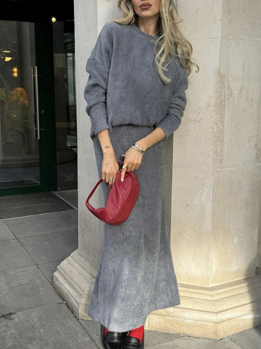 Gray textured knit co-ord set with relaxed fit sweater and maxi skirt.
