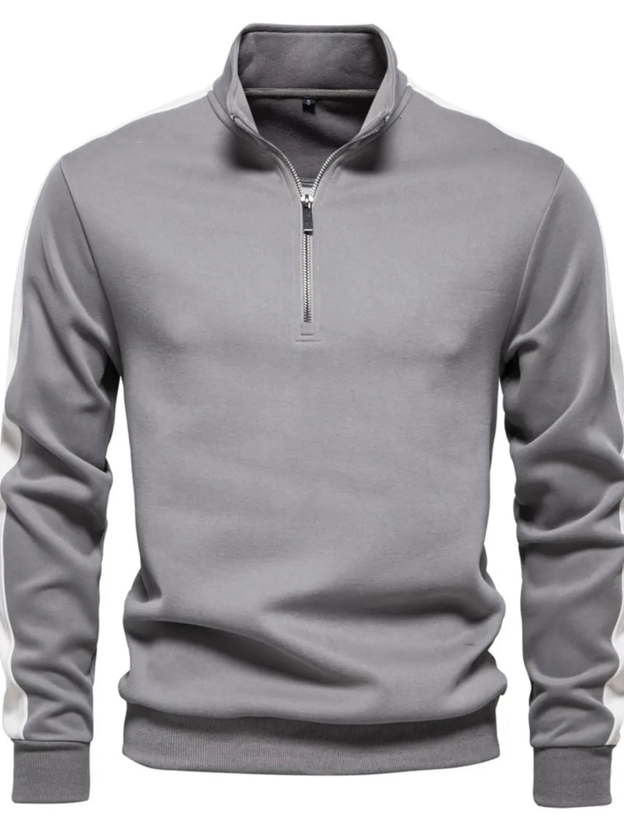Gray quarter-zip sweatshirt with white side panel detail and a stand-up collar.