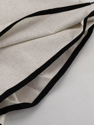 Cream linen blend top with black trim detail