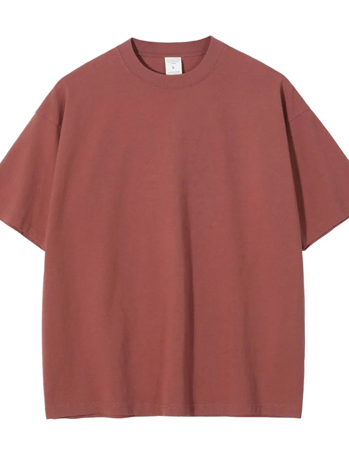 Oversized crewneck tee in rust, relaxed fit, short sleeves, basic casual style.